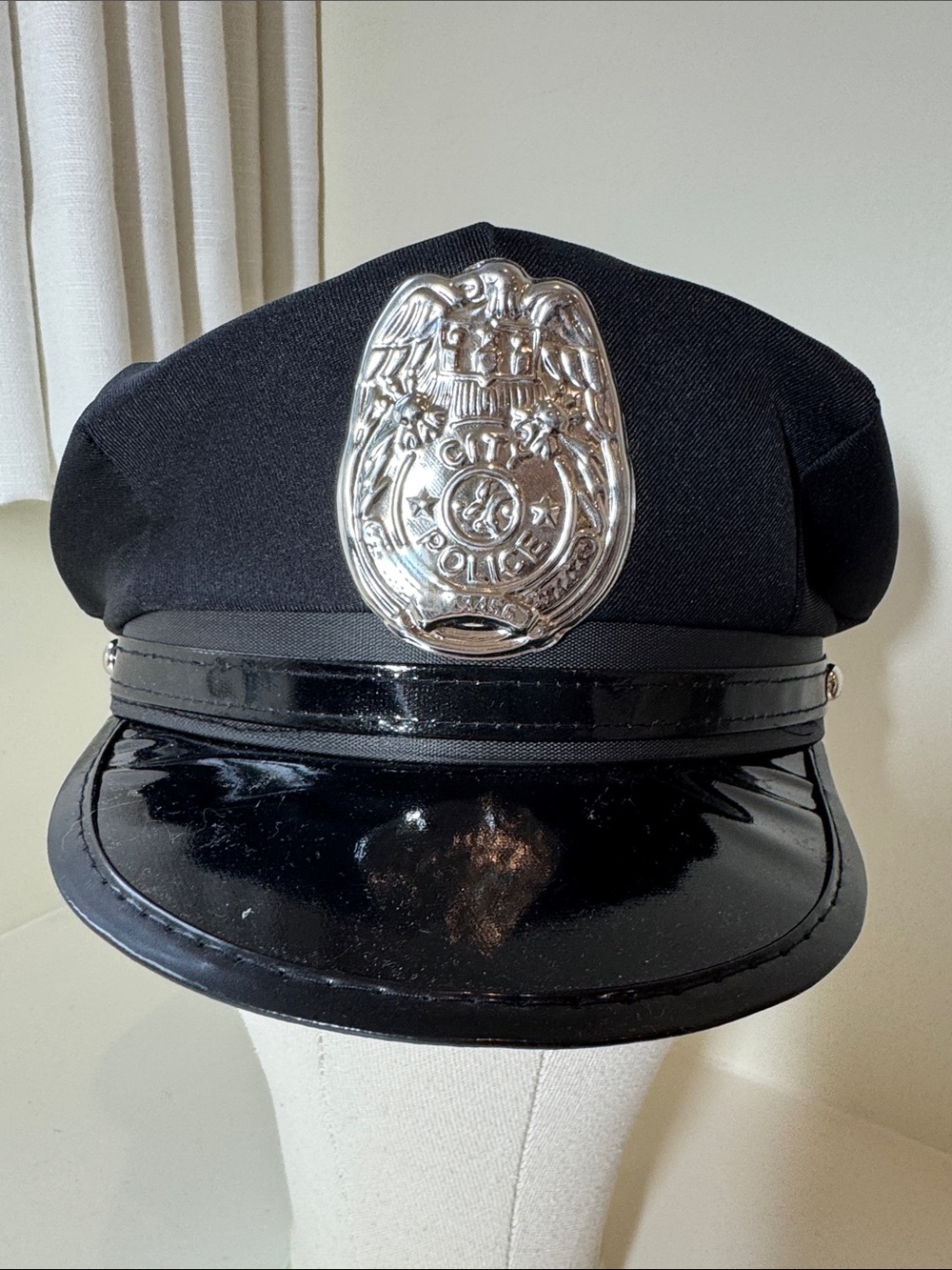 Halloween costume black police hat.